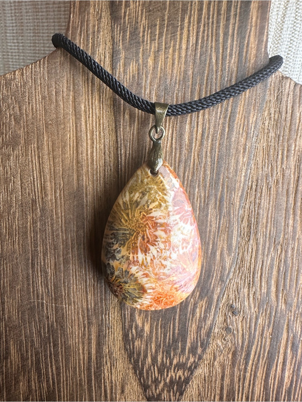 Orange and Black Coral Fossil Teardrop Pendant Necklace on Black Rope - Picture 6 of 16